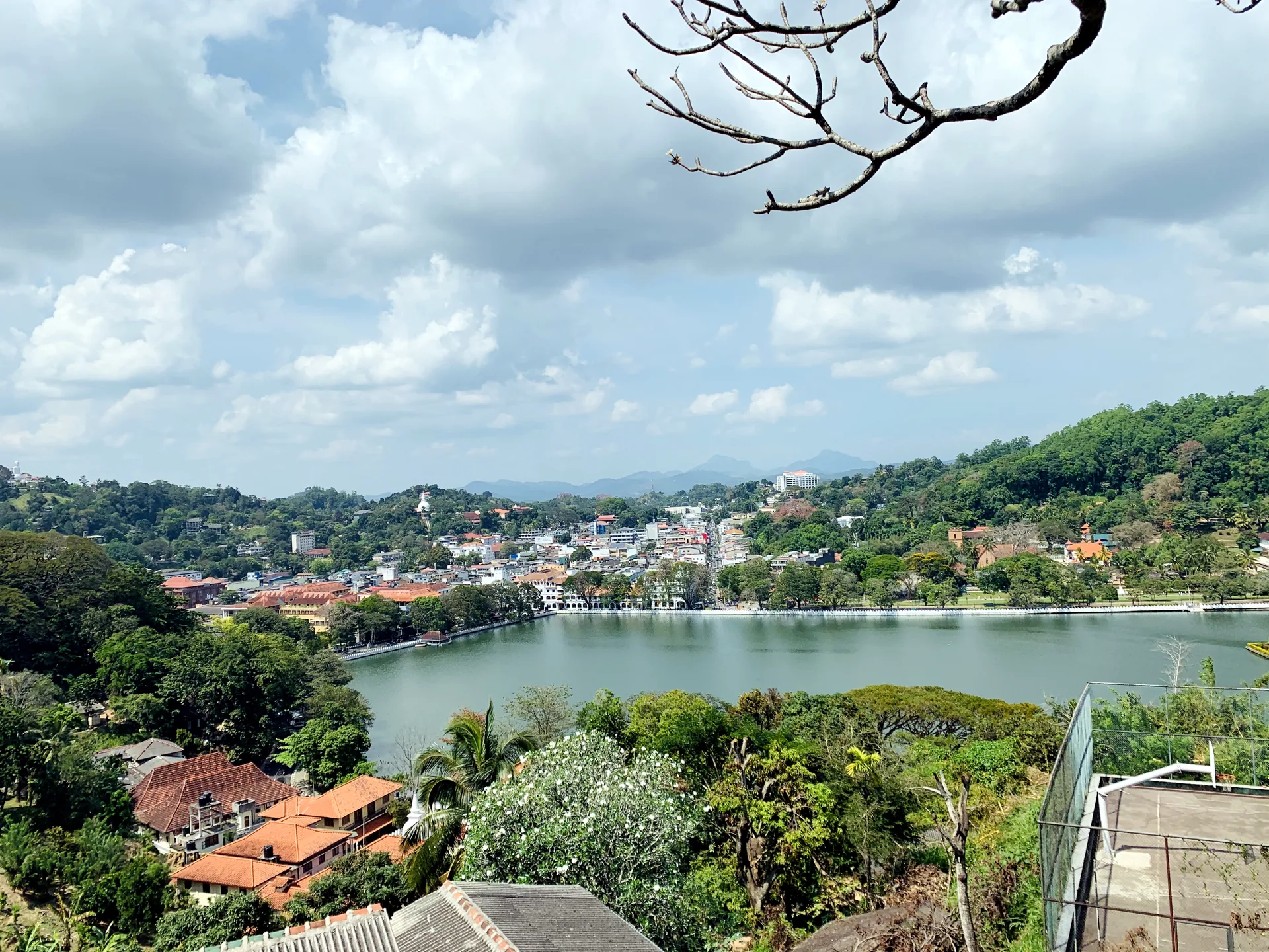 Kandy city view with lake and green hills