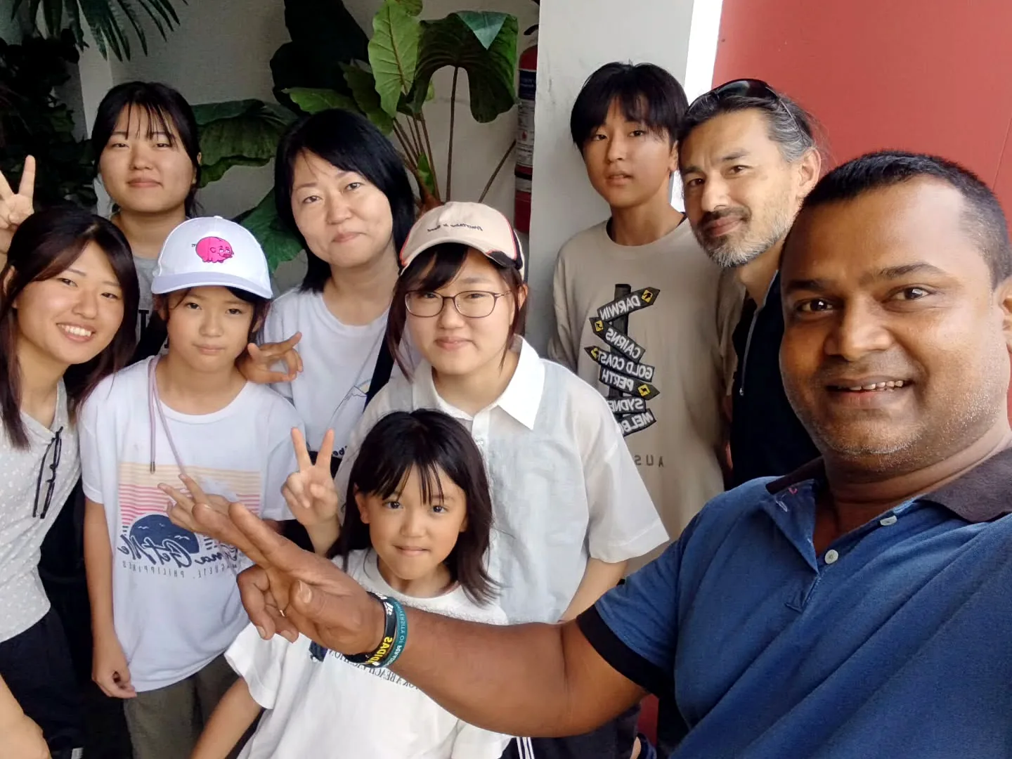 Thilak with a visiting family group in Kandy