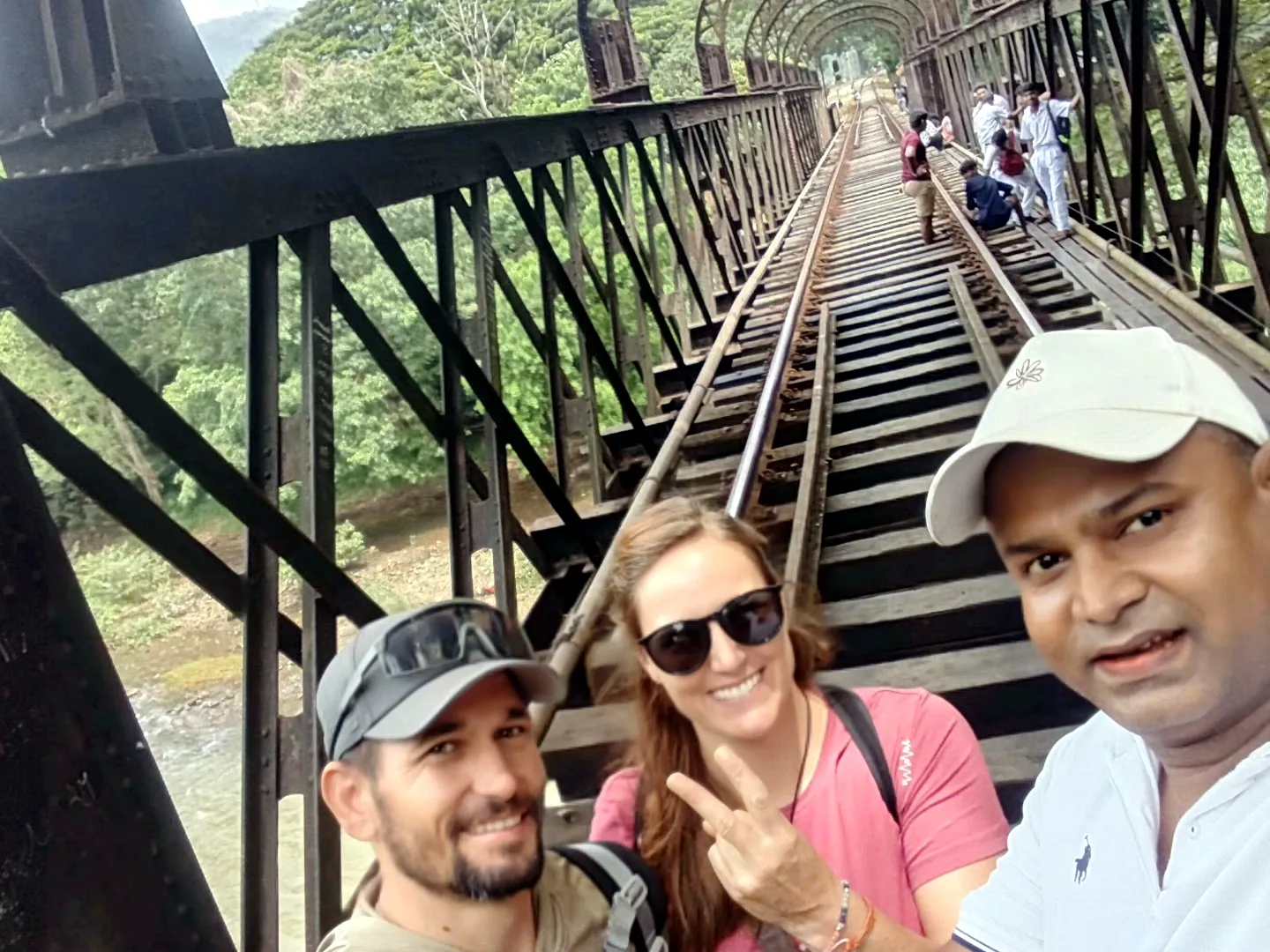 Couple with Thilak on a Kandy suspension bridge
